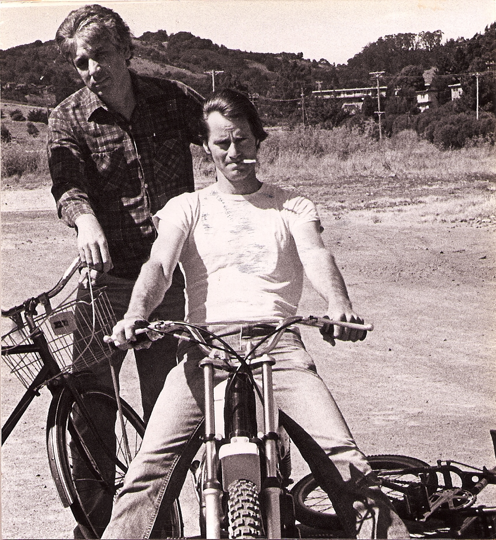 Sam Shepard and Johnny Dark on a bicycle